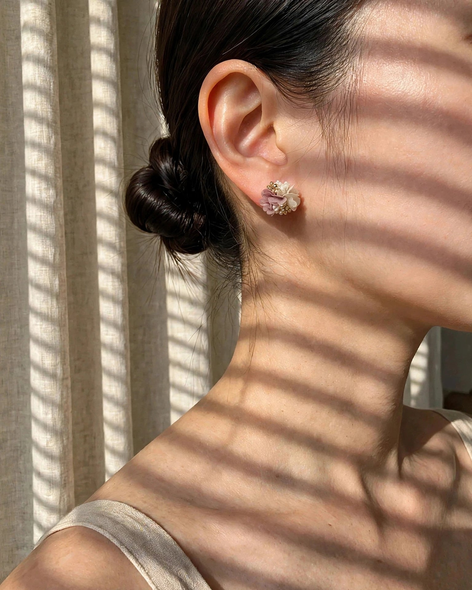 Fleur d'Or Stud Earrings in Brown on Model