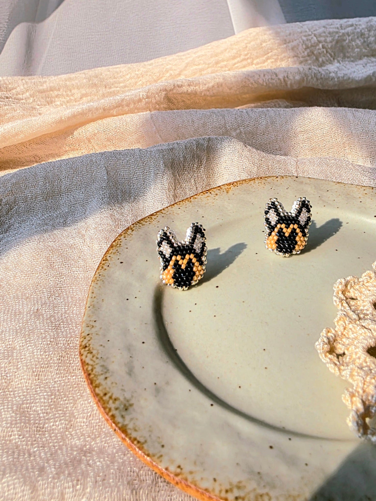 German shepherd stud earrings left