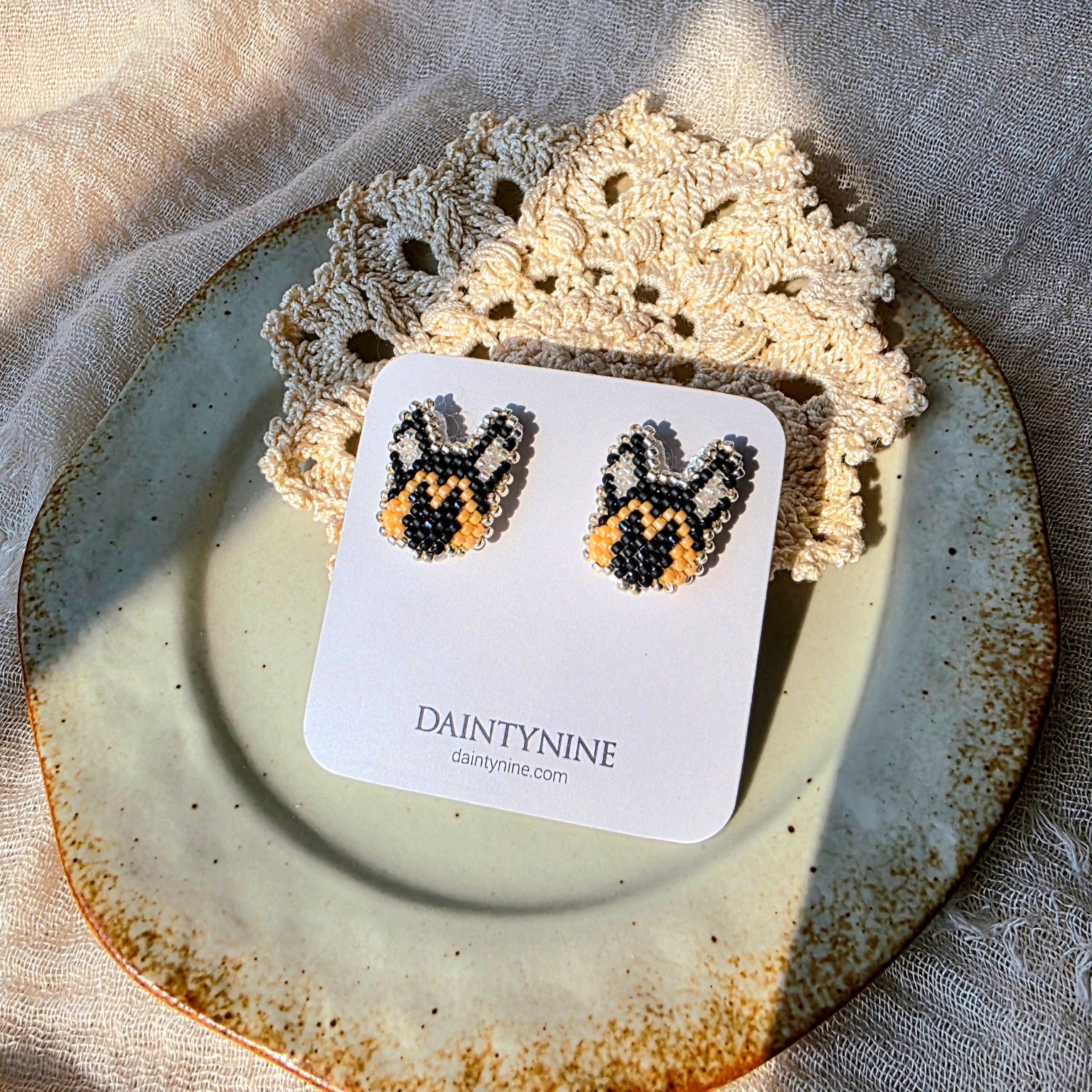 German shepherd stud earrings on card