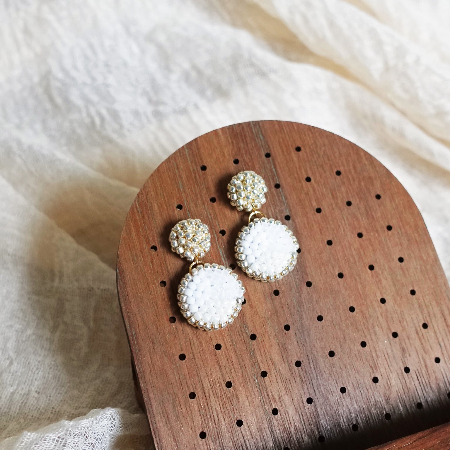 Goldie Drop Earrings in Cloud White Display Left