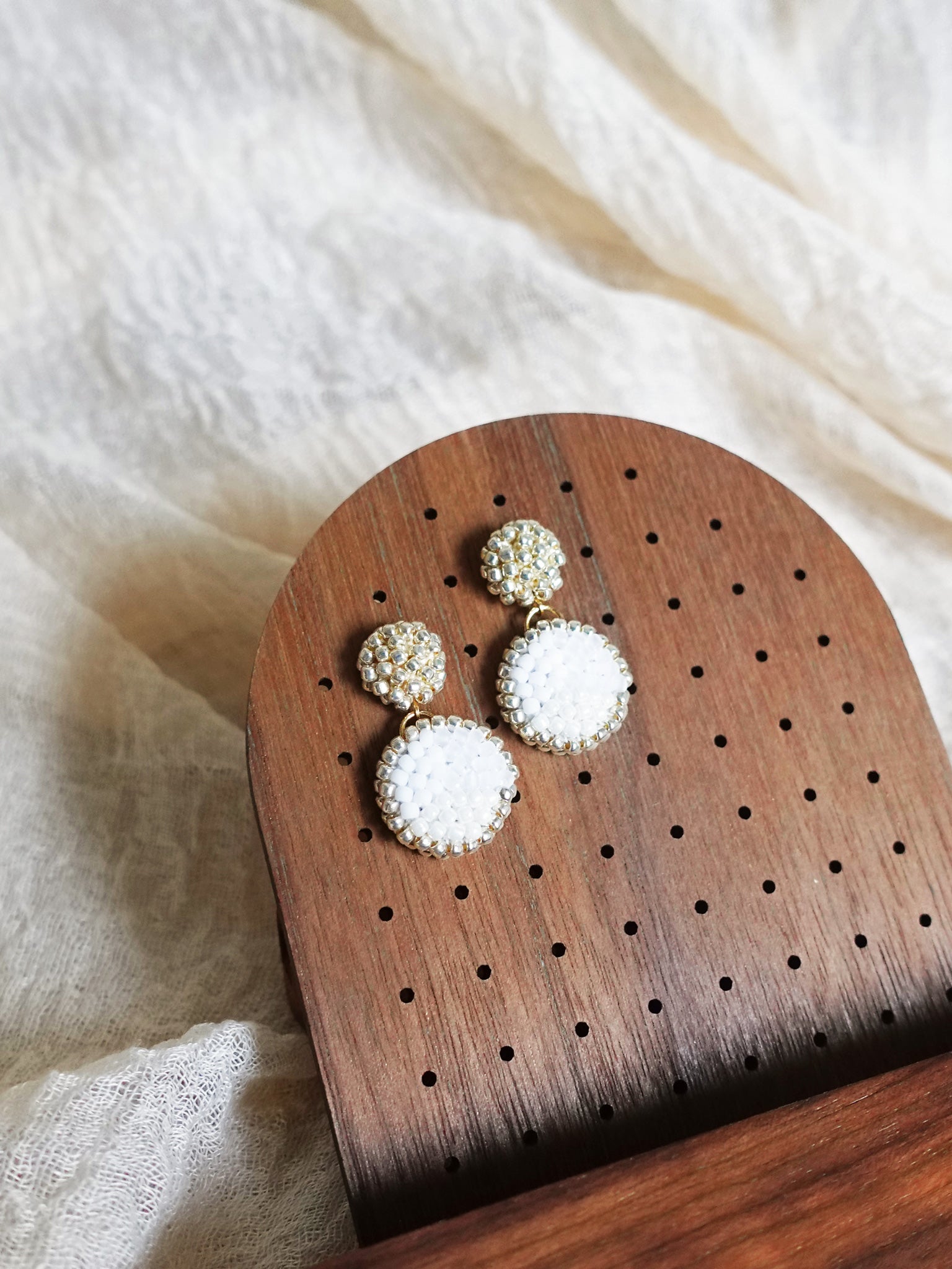 Goldie Drop Earrings in Cloud White Display Left