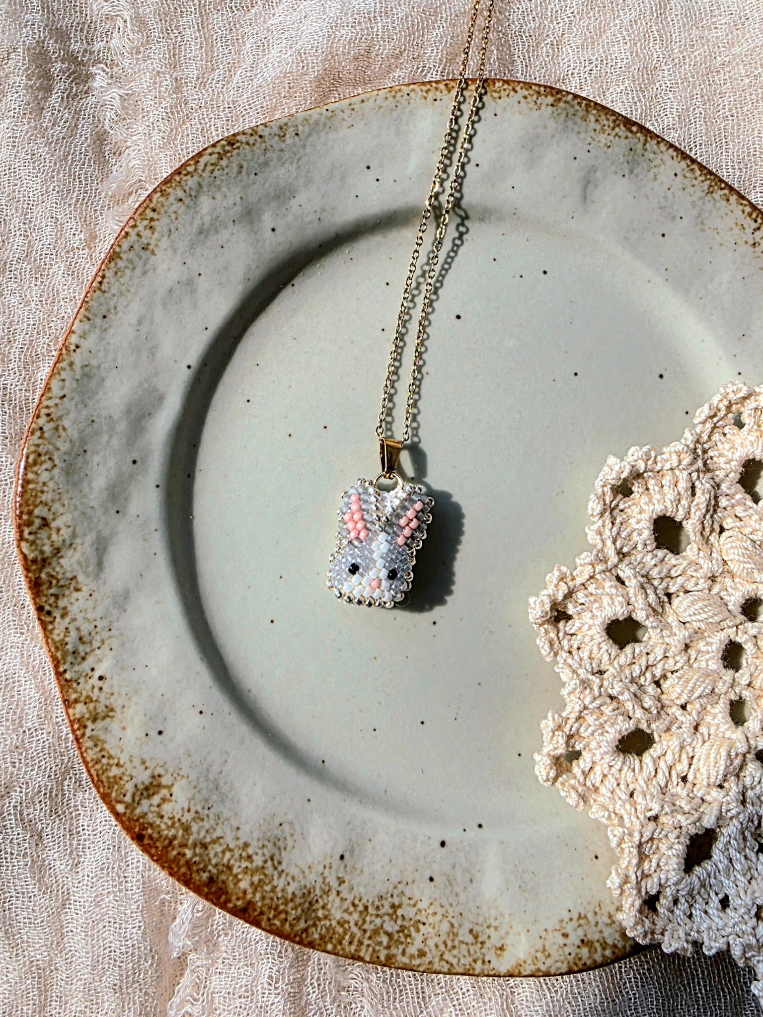 Grey bunny necklace right