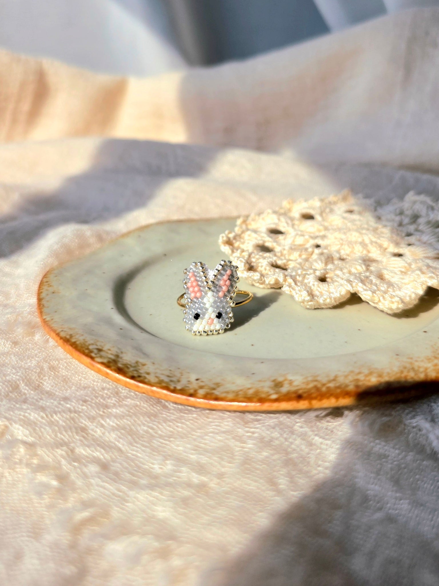 Grey bunny ring front