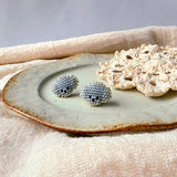 Grey poodle stud earrings front