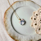 Grey tabby cat necklace left