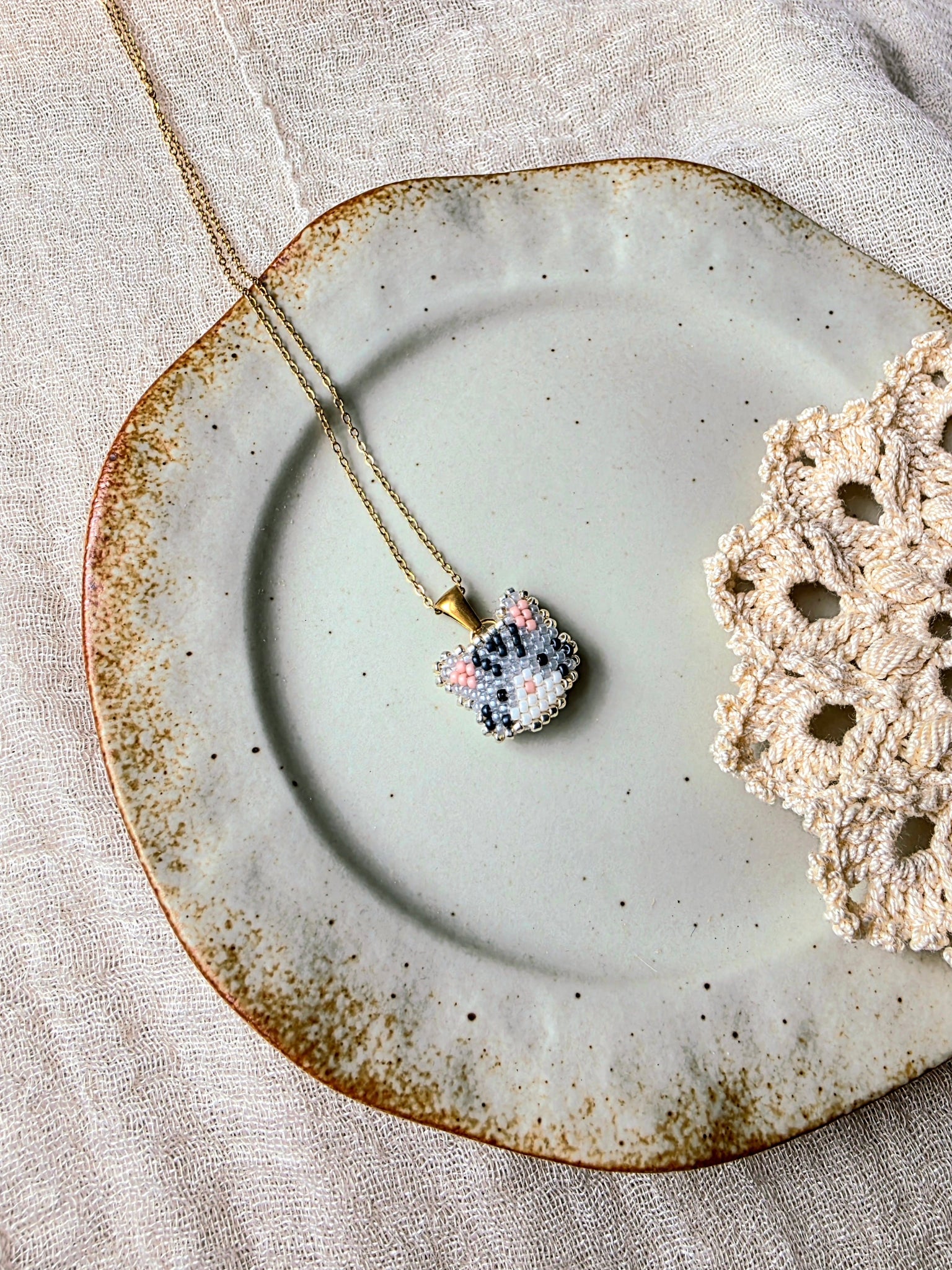 Grey tabby cat necklace left