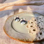 Husky stud earrings front
