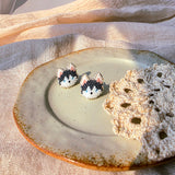Husky stud earrings front