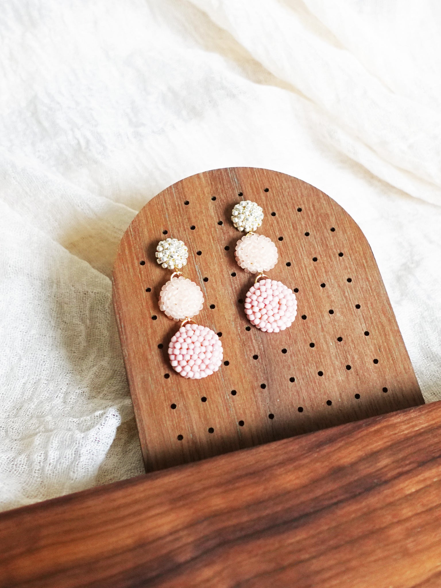 Juno Earrings in Blush Pink Display Left