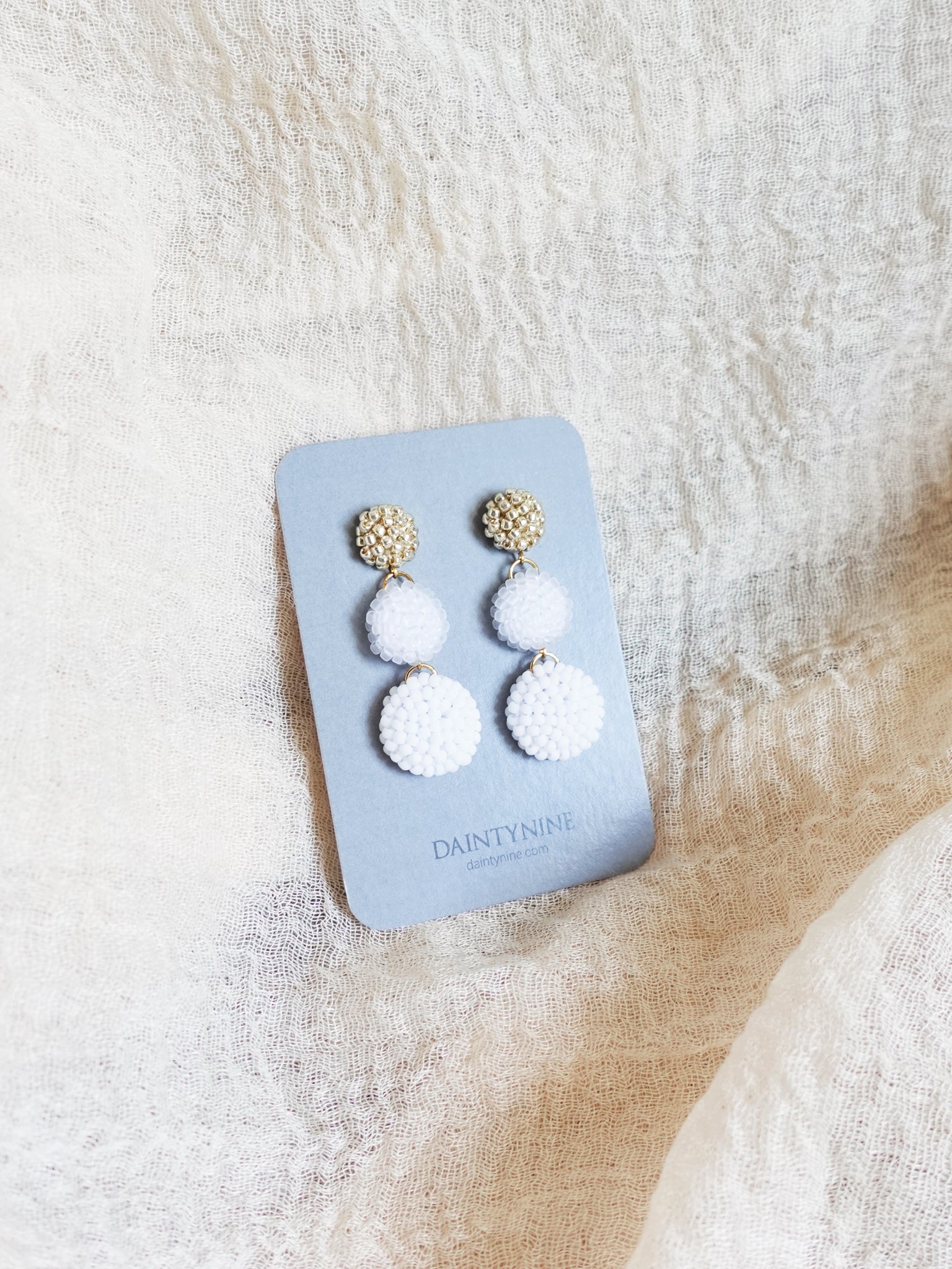 Juno Earrings in Cloud White Card Left