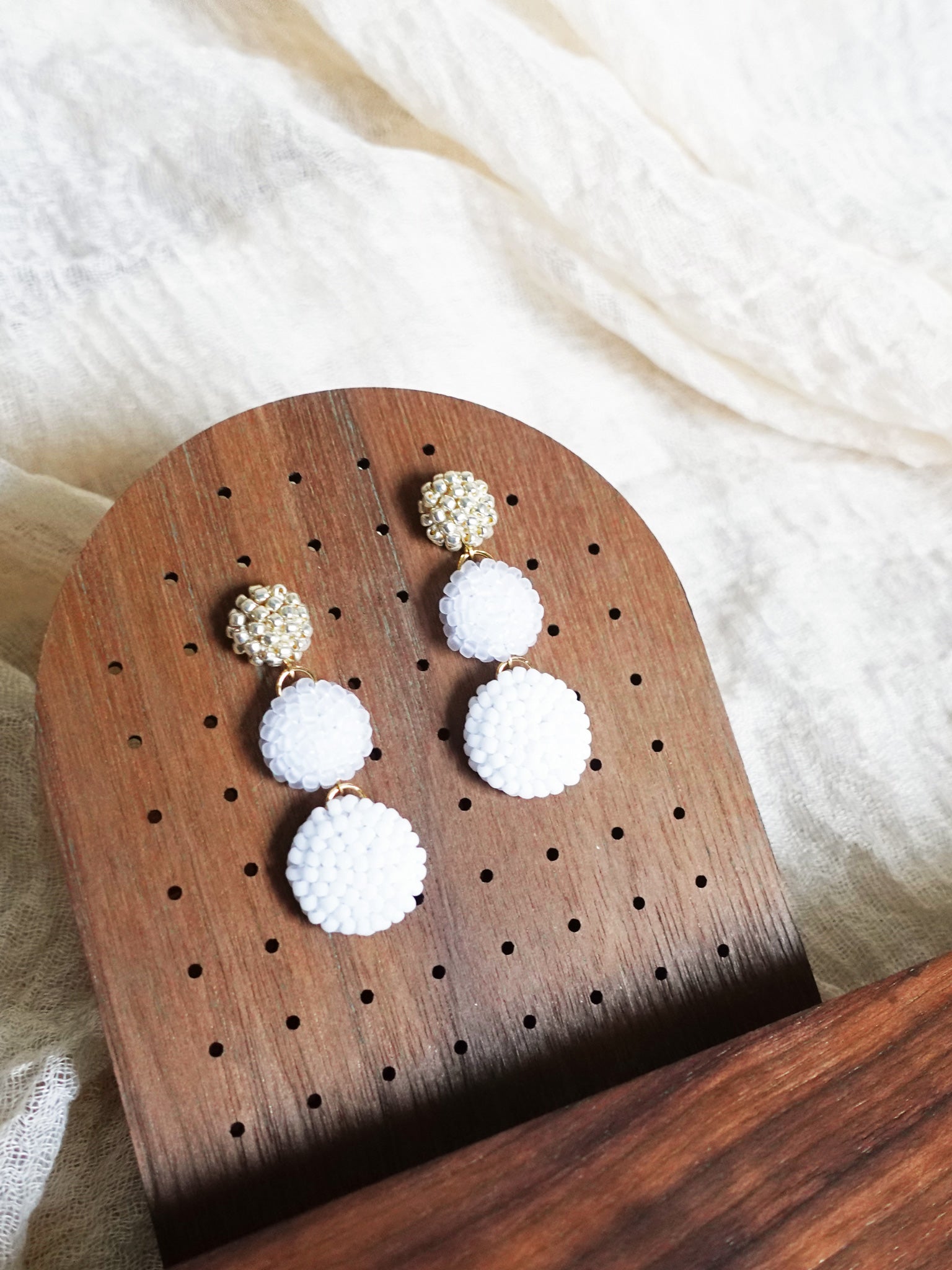 Juno Earrings in Cloud White Display Left