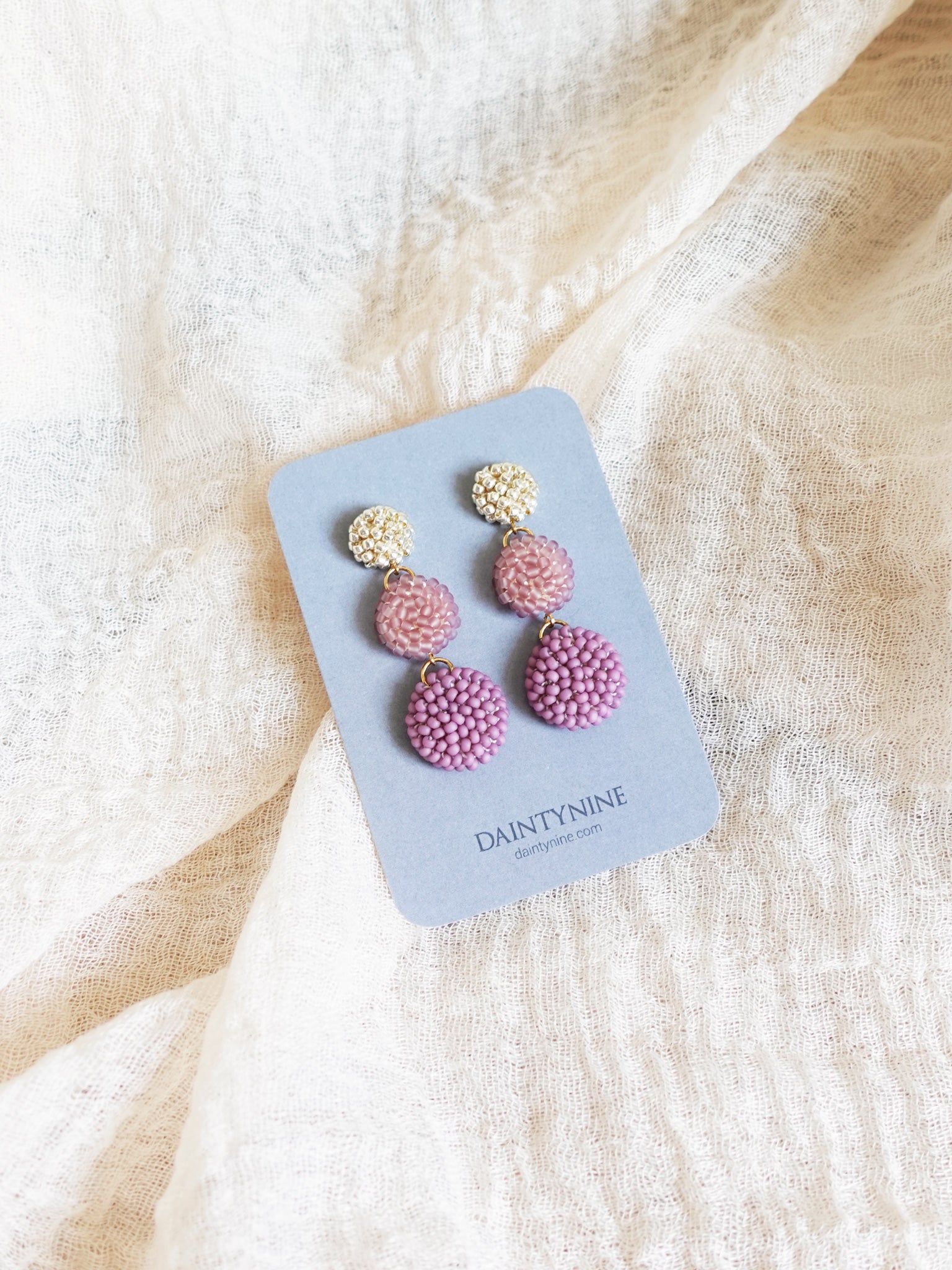 Juno Earrings in Mauve Purple Card