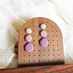 Juno Earrings in Mauve Purple Display Front