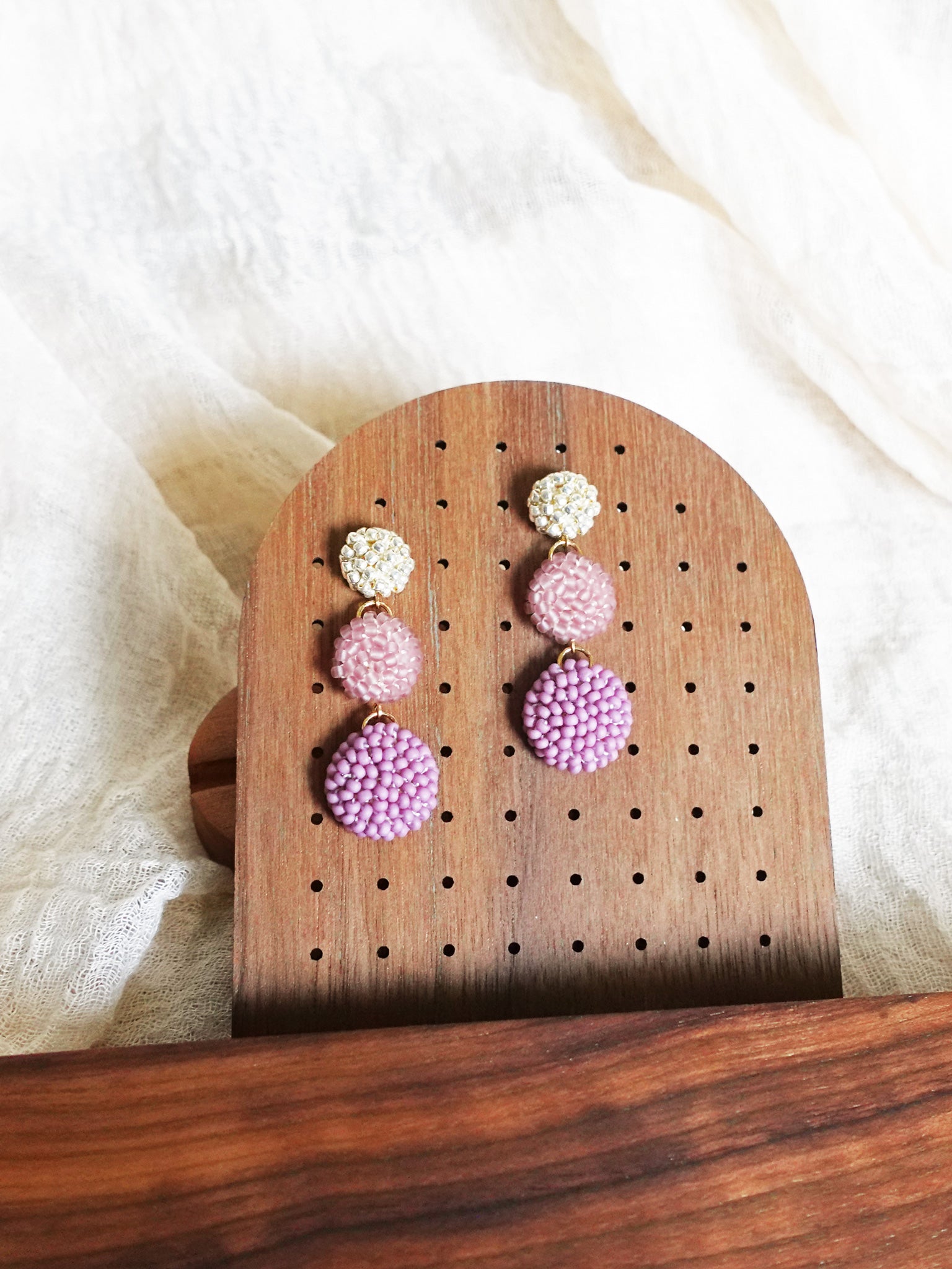 Juno Earrings in Mauve Purple Display Front