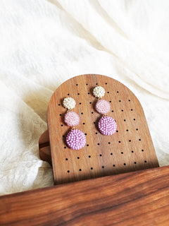 Juno Earrings in Mauve Purple Display Left