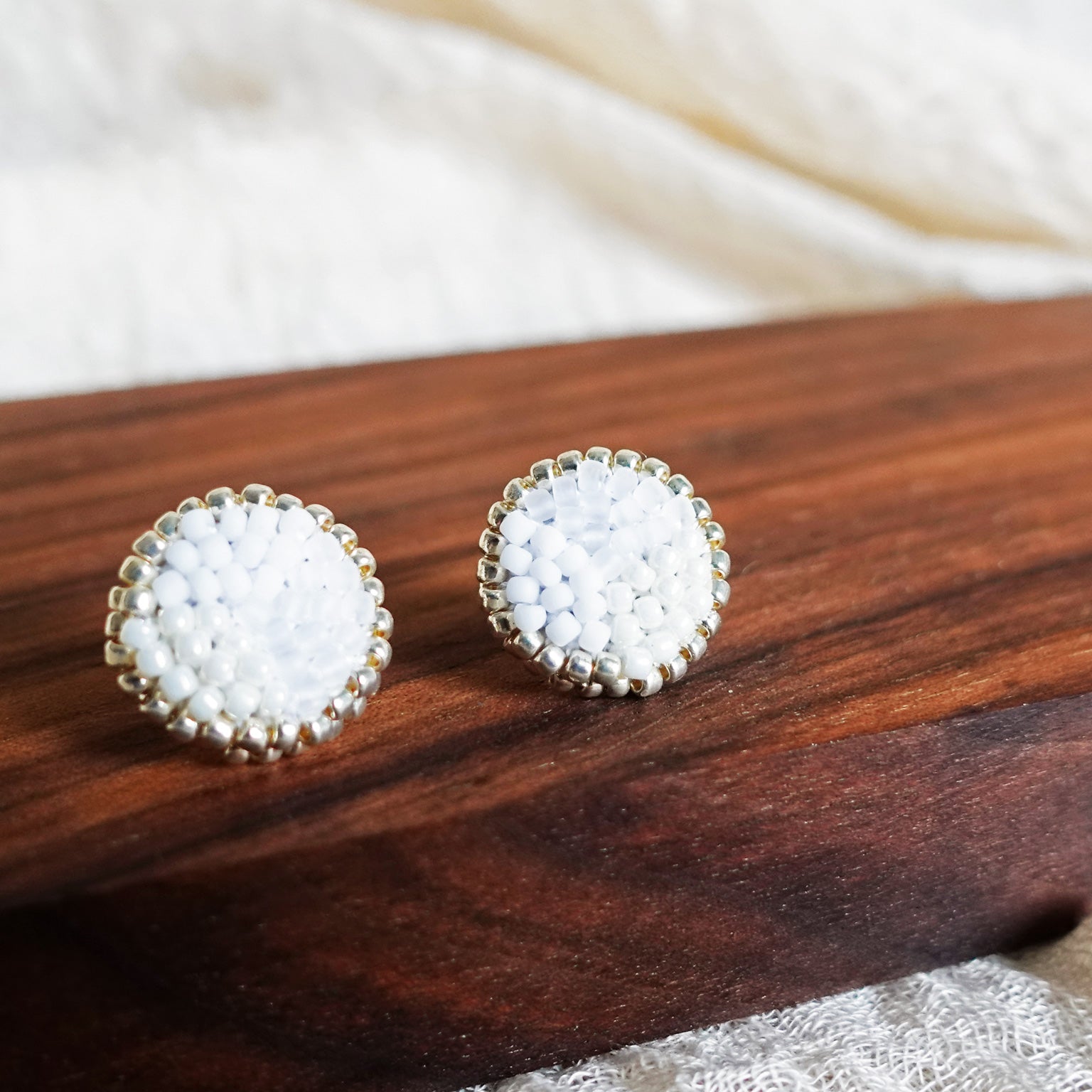 Kaylee Stud Earrings in Cloud White Display Close
