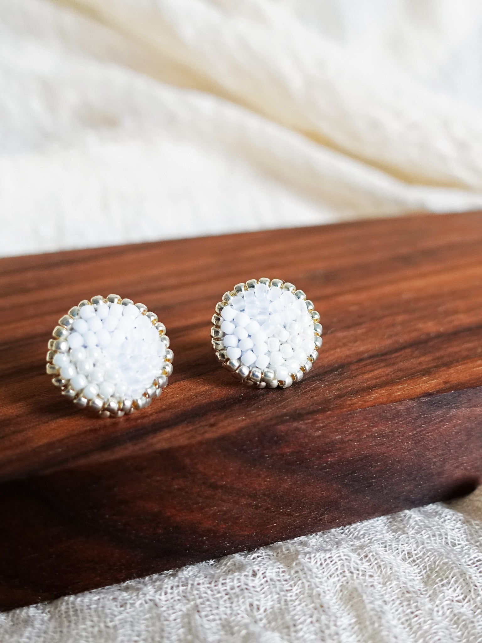 Kaylee Stud Earrings in Cloud White Display Close