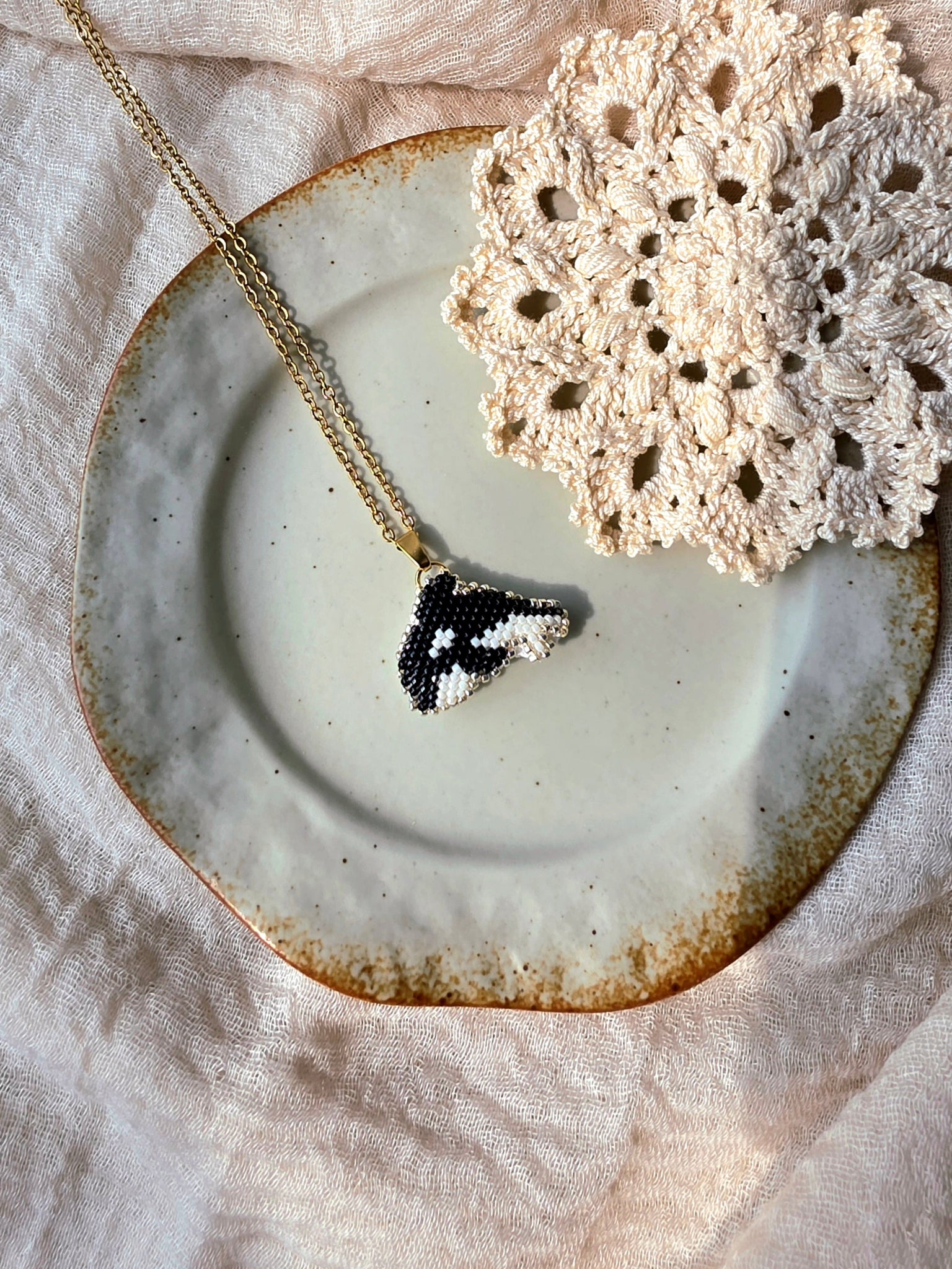 Killer whale orca necklace left