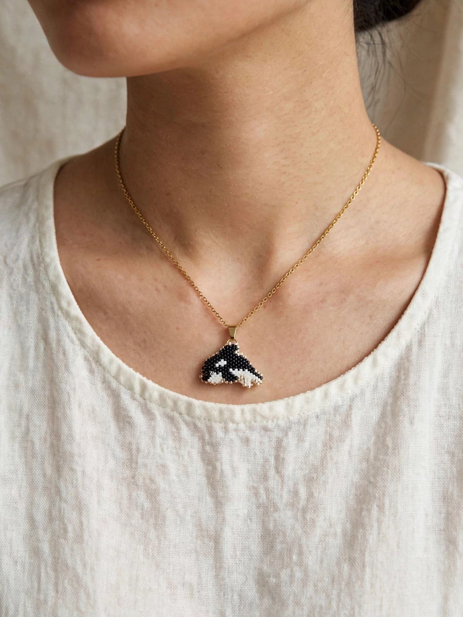 Killer whale orca necklace on model