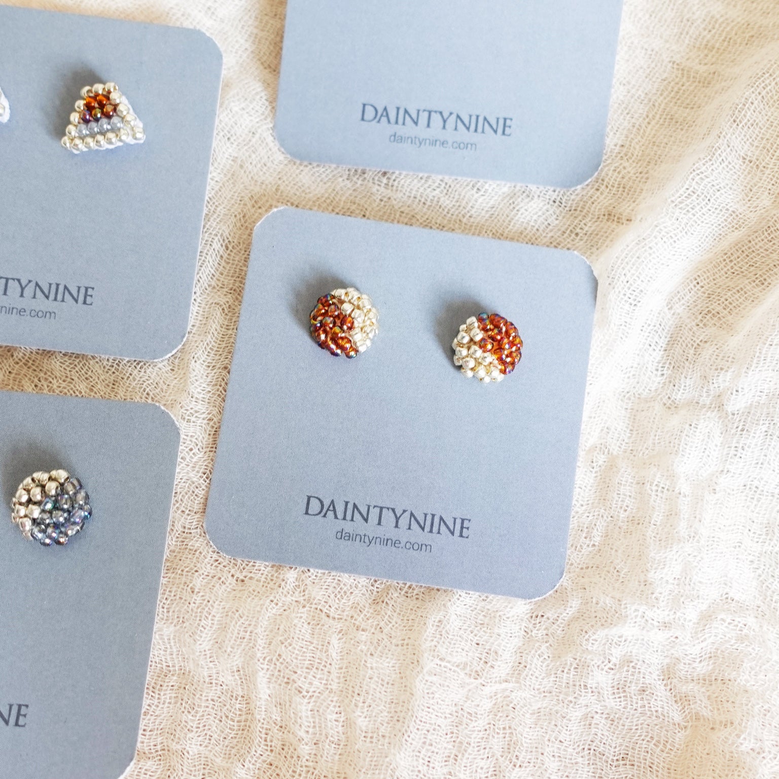 Last Quarter Stud Earrings in Rainbow Amber Card