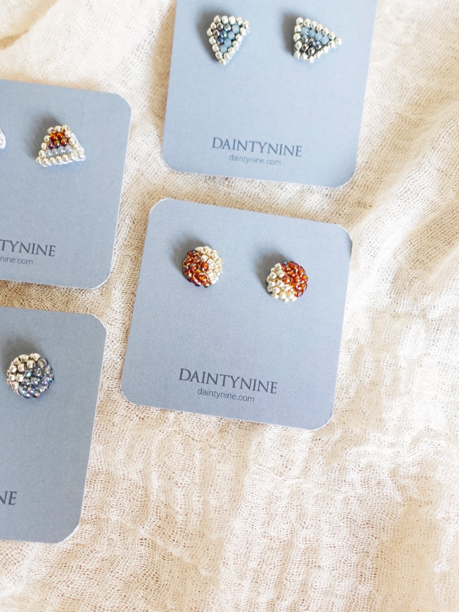 Last Quarter Stud Earrings in Rainbow Amber Card