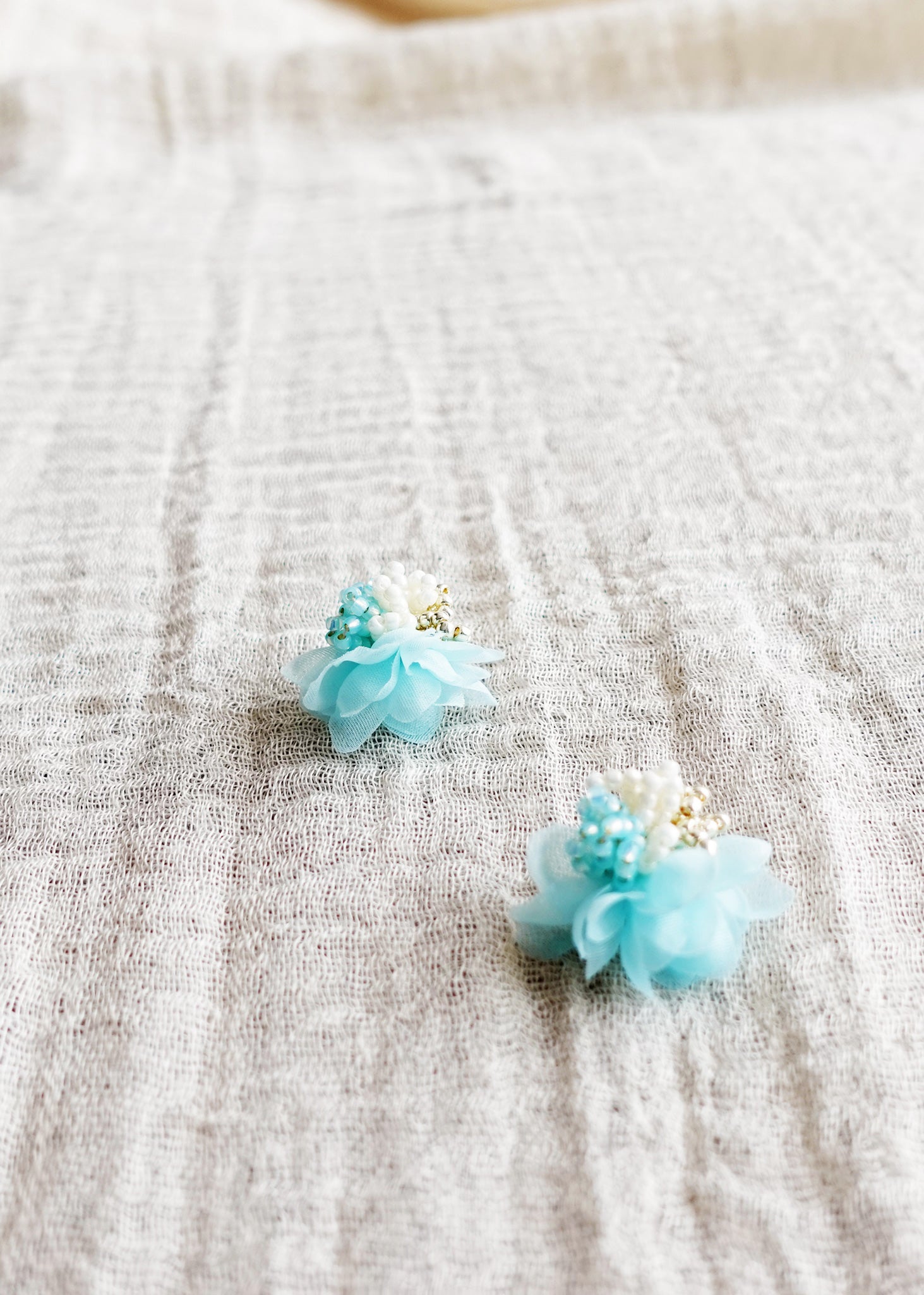 Luna Bloom Stud Earrings in Light Blue Left Front