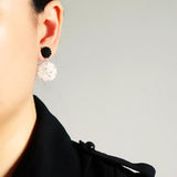 Maevan Earrings in Black Model