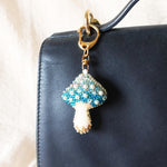 Magical Mushroom Charm in Blue Bag Close