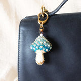 Magical Mushroom Charm in Blue Bag Close