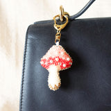 Magical Mushroom Charm in Red Bag Close