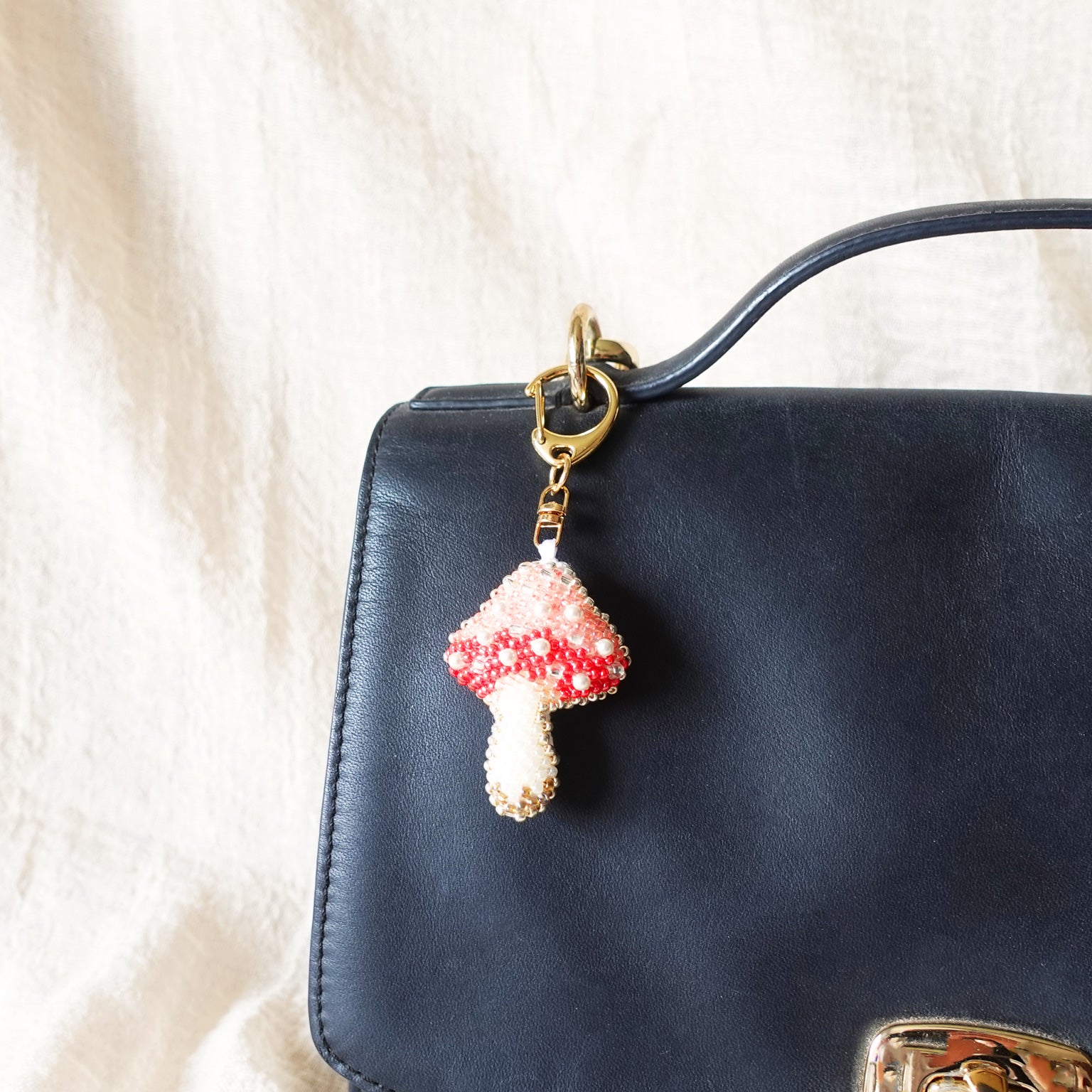 Magical Mushroom Charm in Red Bag Right