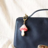 Magical Mushroom Charm in Red Bag Right