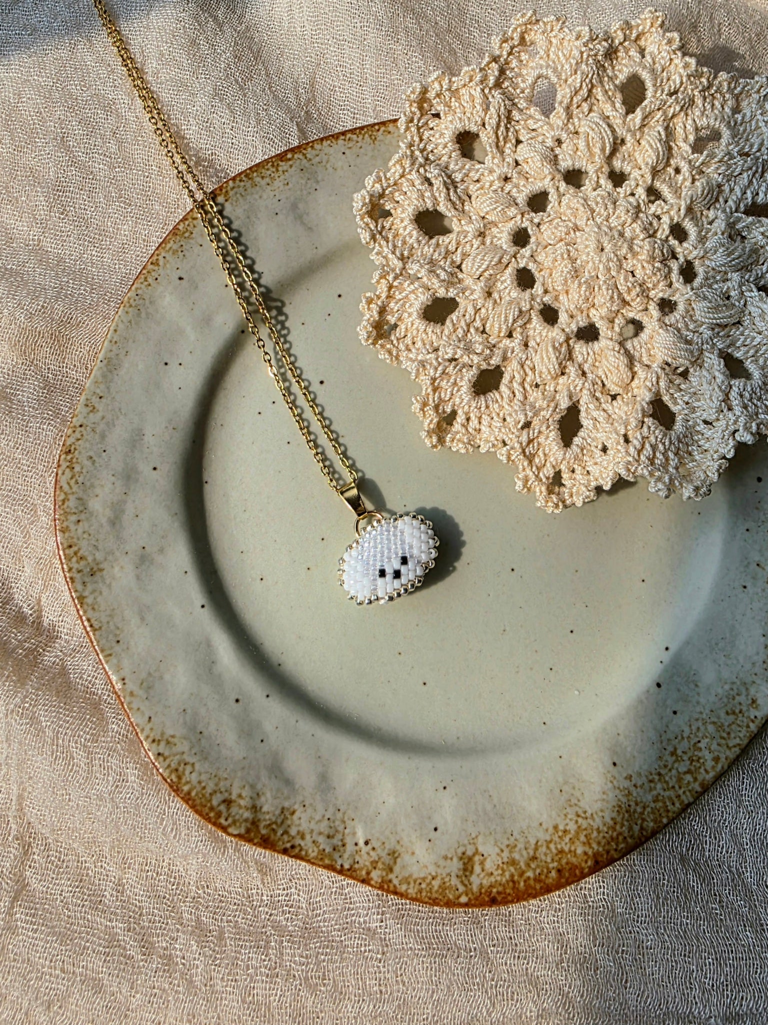Maltese necklace left angle