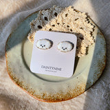 Maltese stud earrings on card