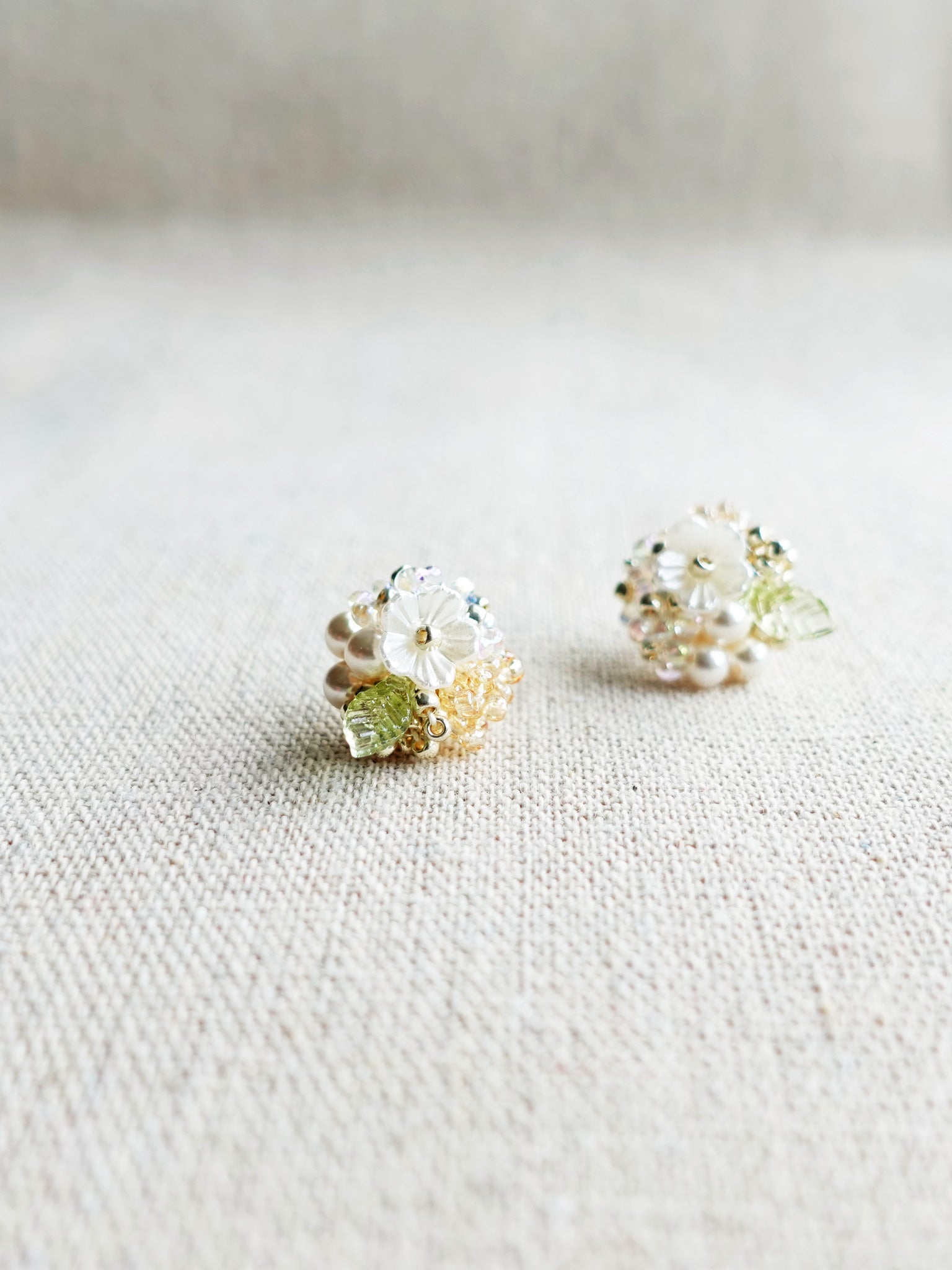 Marigold Stud Earrings in Champagne Left