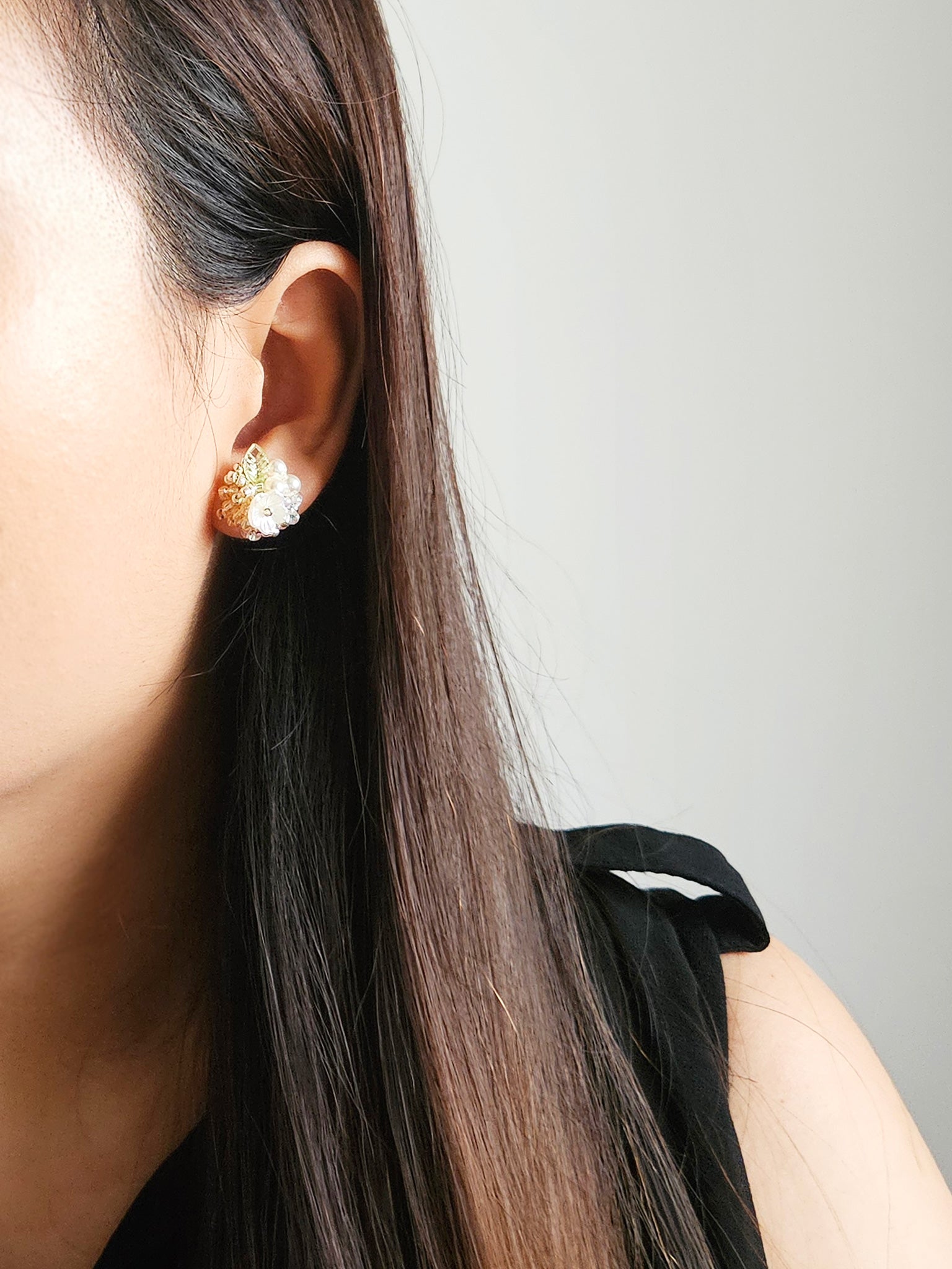 Marigold Stud Earrings in Champagne Model