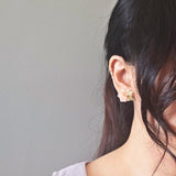 Moonlit Petals Stud Earrings in Coral Model