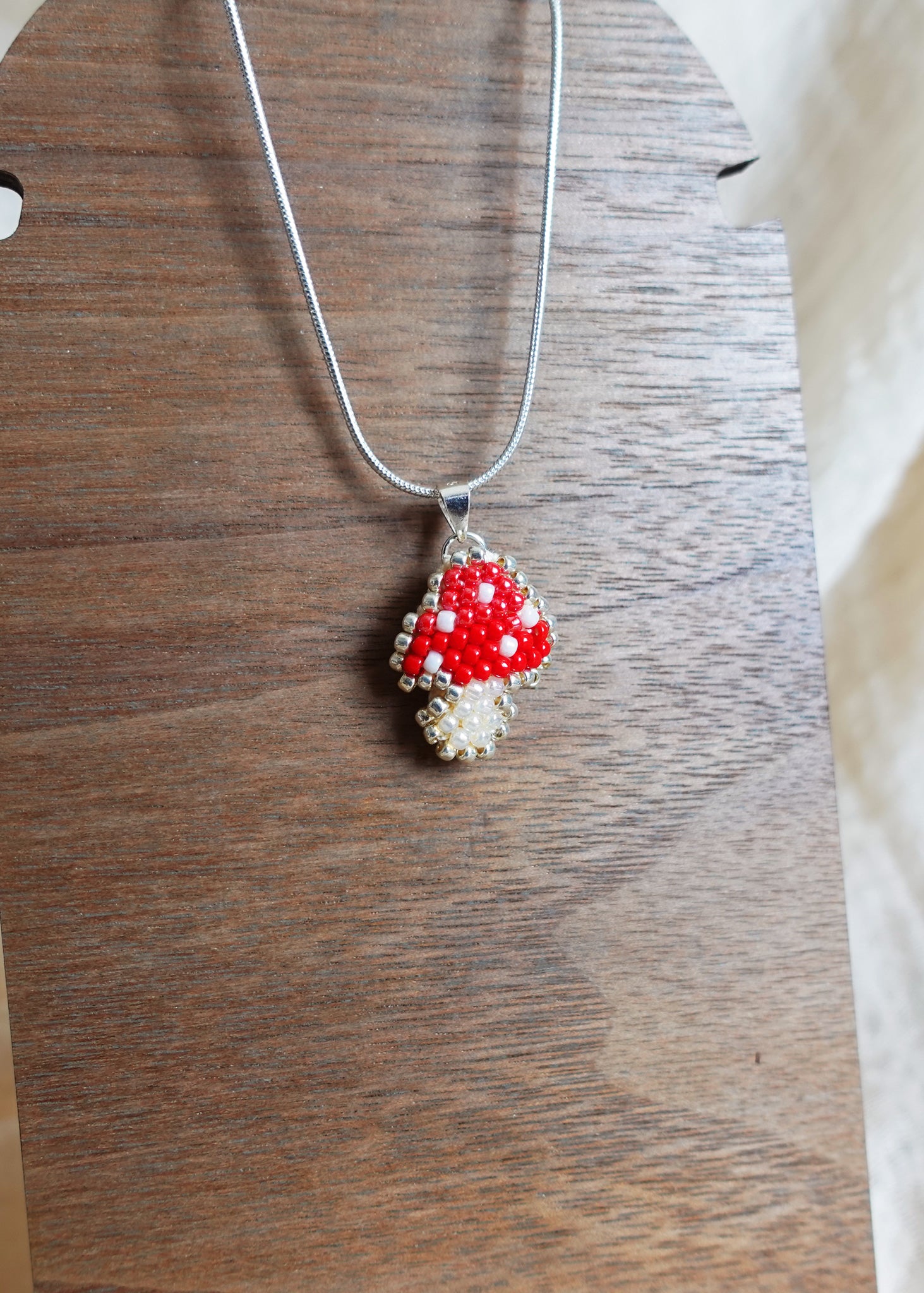 Mushroom Necklace Display Left
