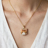 Orange tabby cat necklace on model