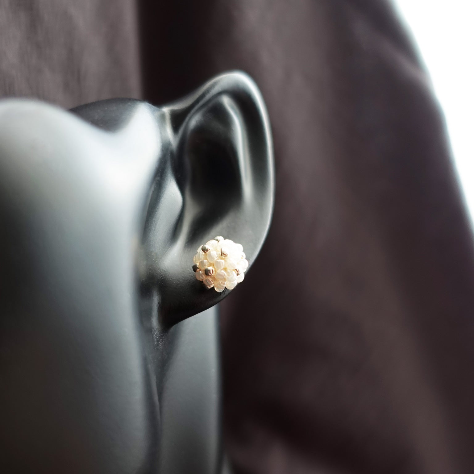 Orb Star Dust Stud Earrings in Ivory Bust