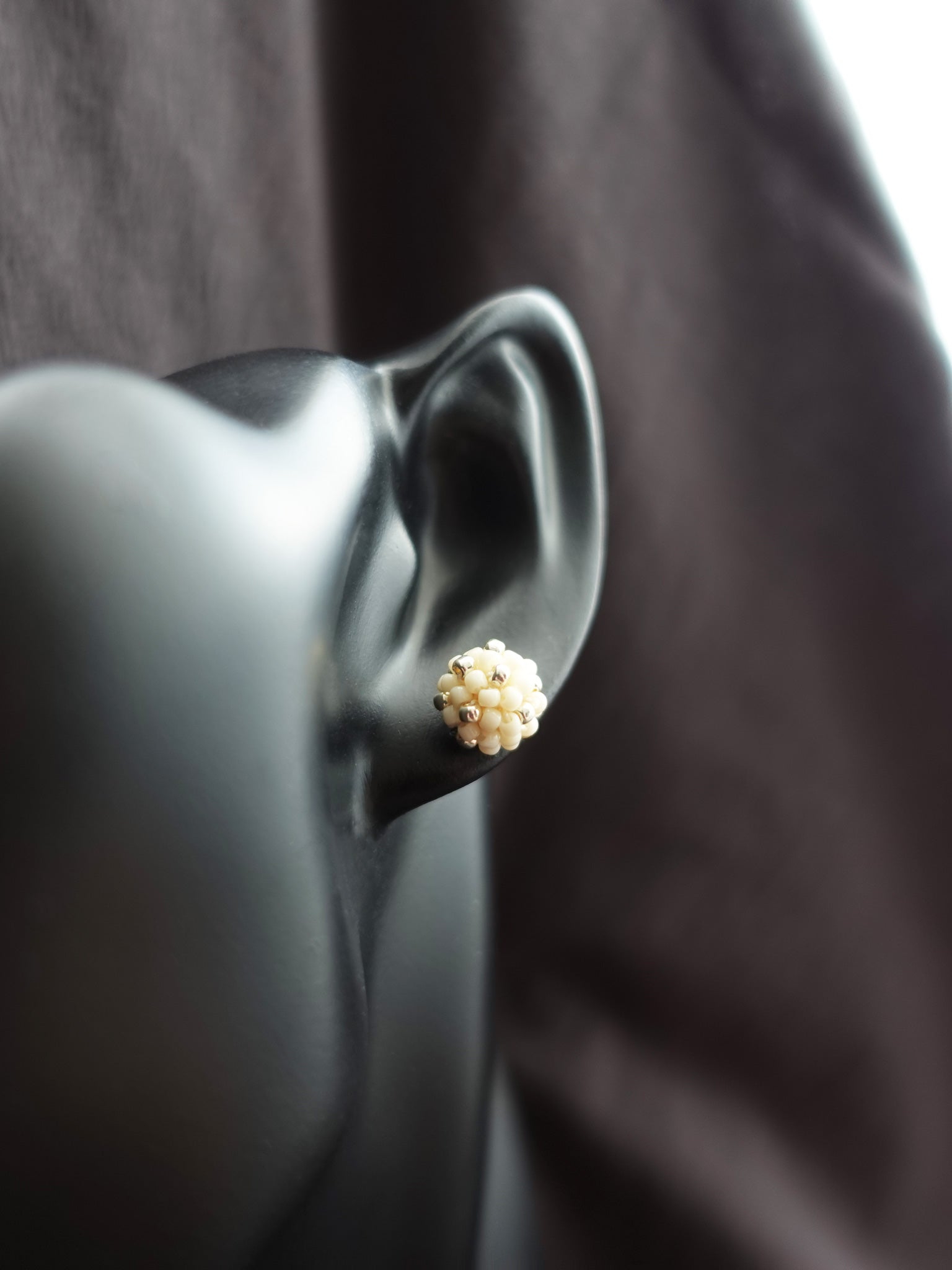 Orb Star Dust Stud Earrings in Milk White Bust