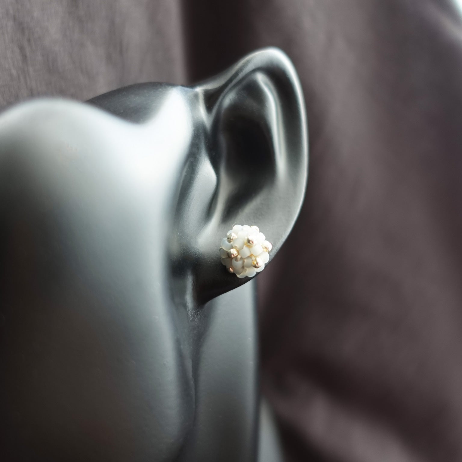 Orb Star Dust Stud Earrings in Smoke Grey Bust