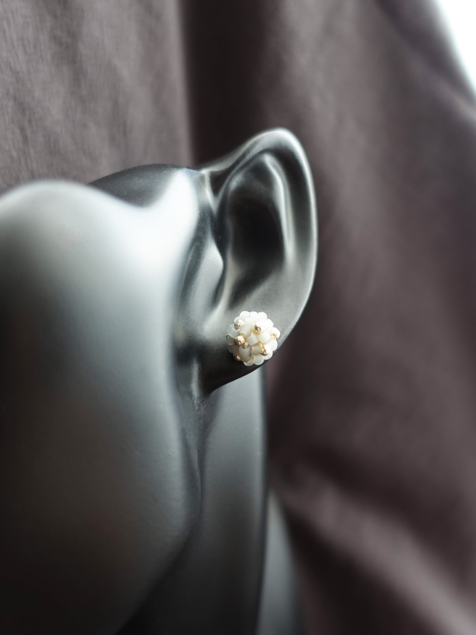 Orb Star Dust Stud Earrings in Smoke Grey Bust