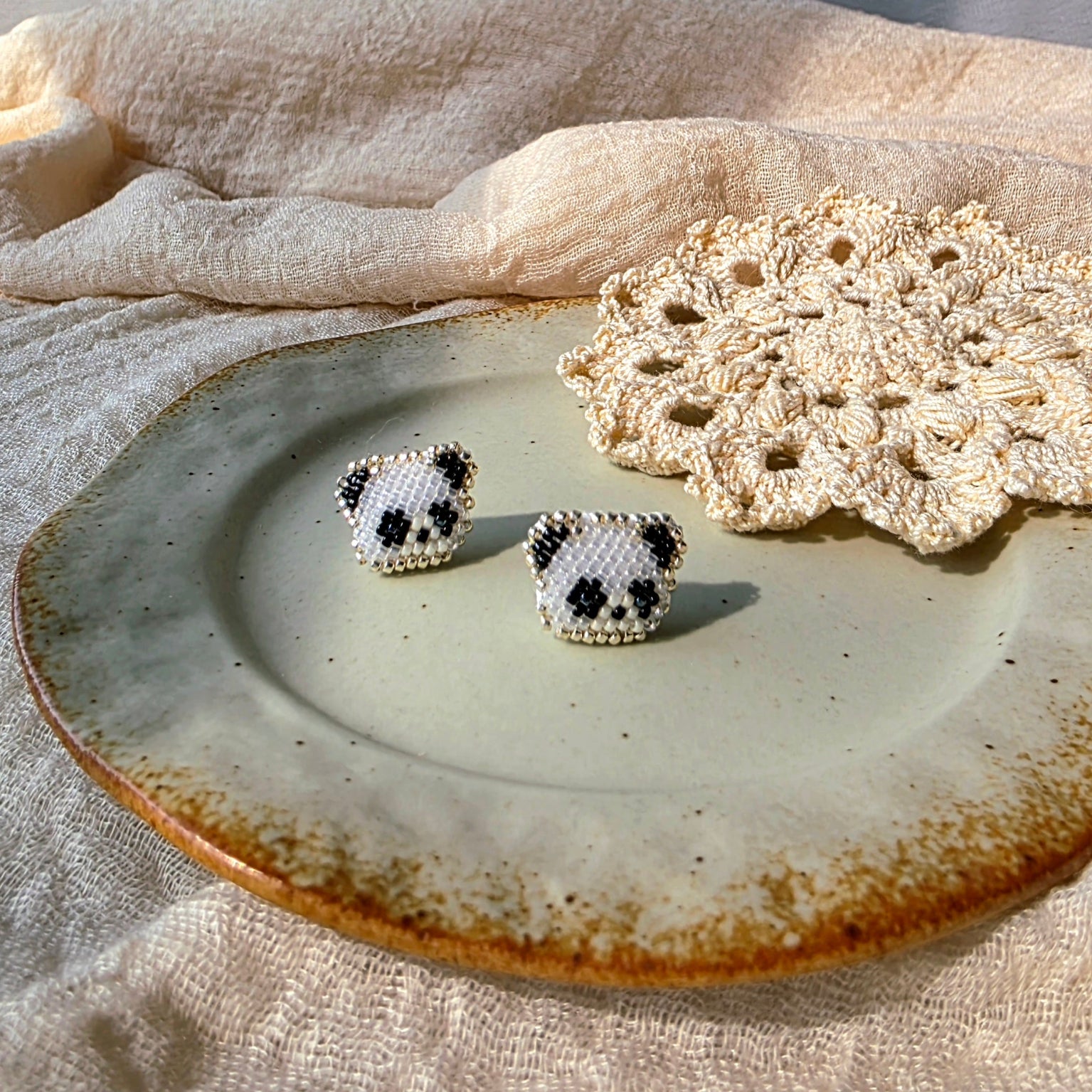Panda stud earrings front