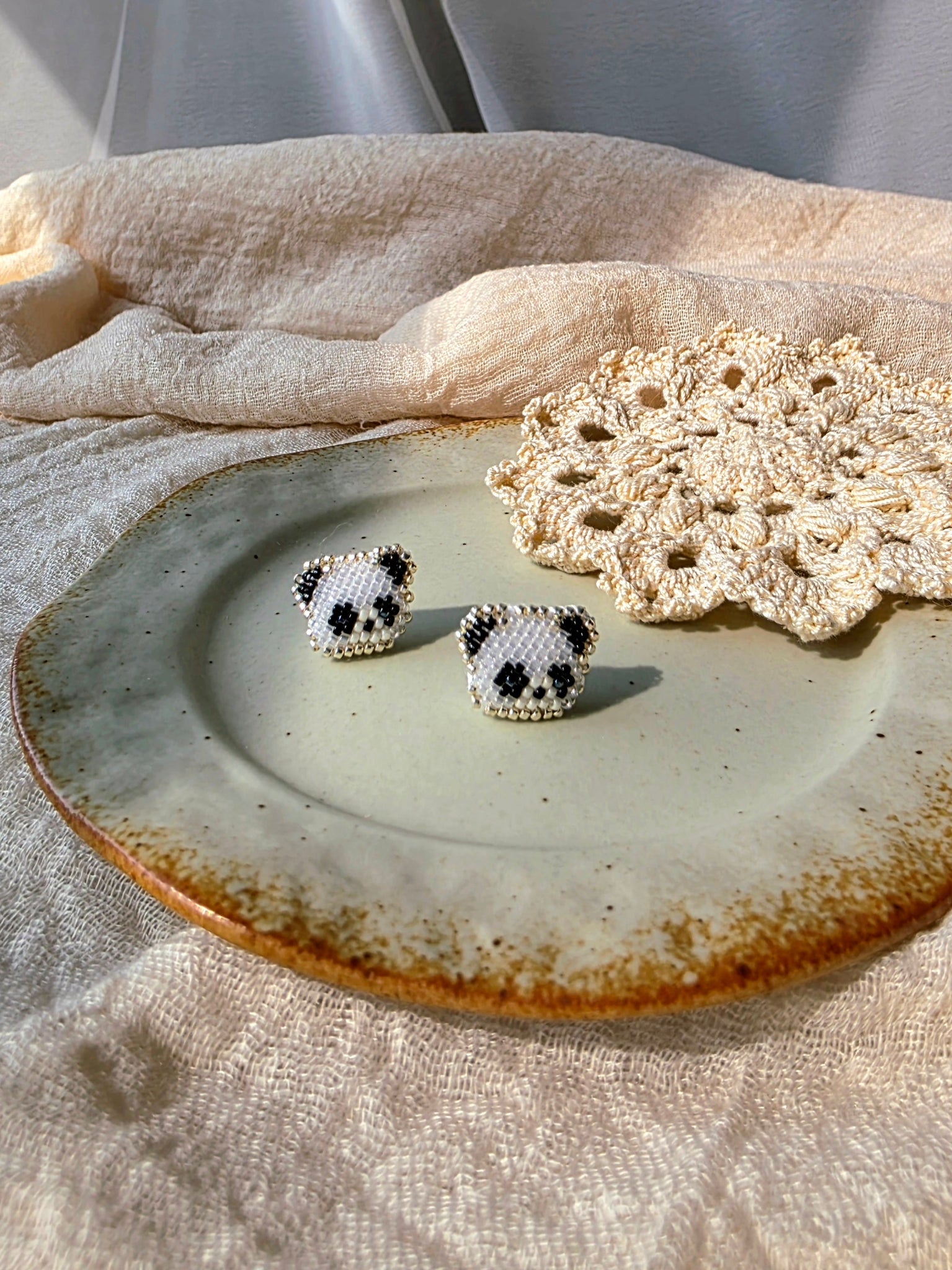 Panda stud earrings front