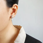 Phoebe Trio Earrings in Mauve Purple Model