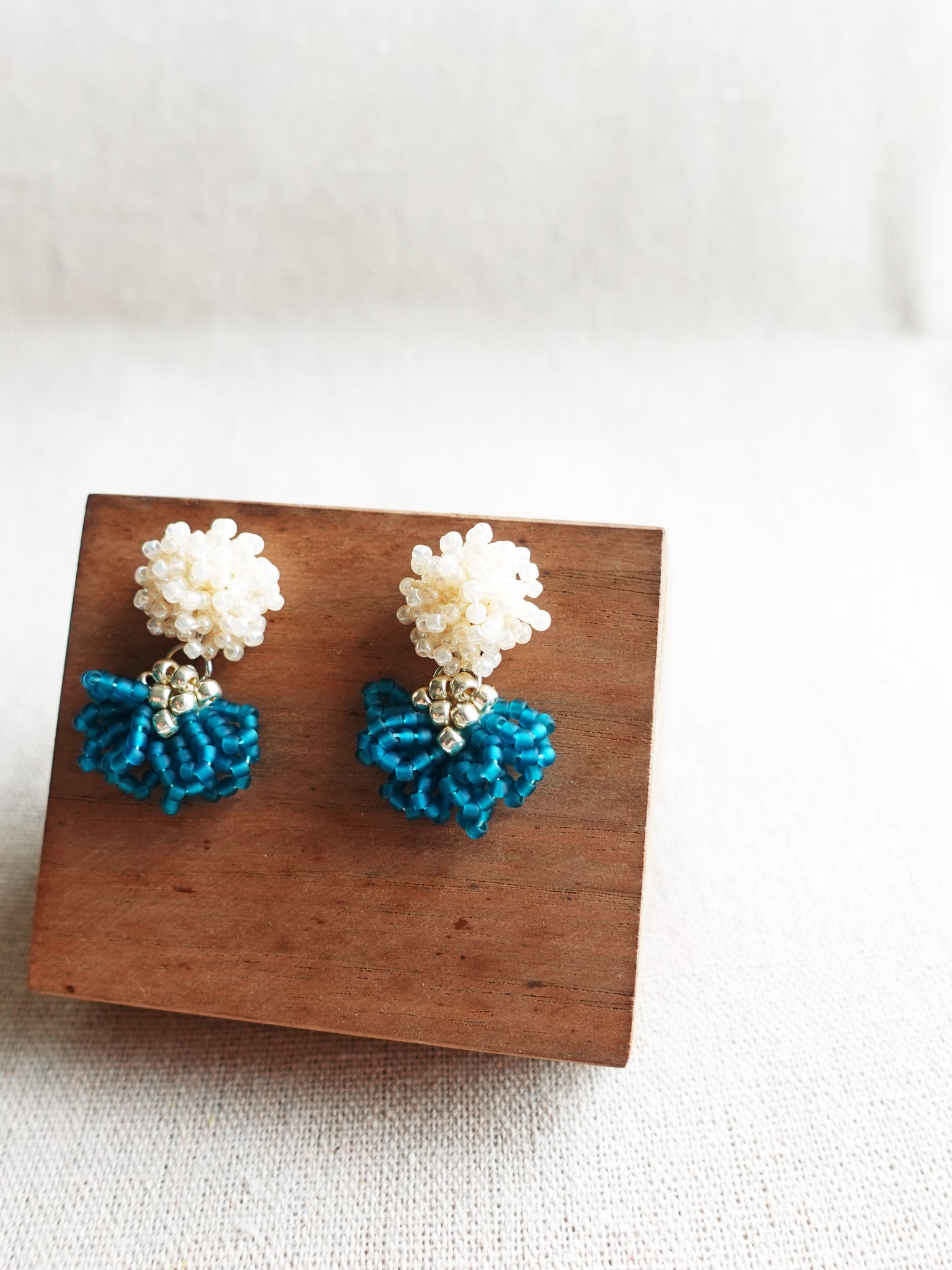 Phoenix Earrings in Teal Display Front