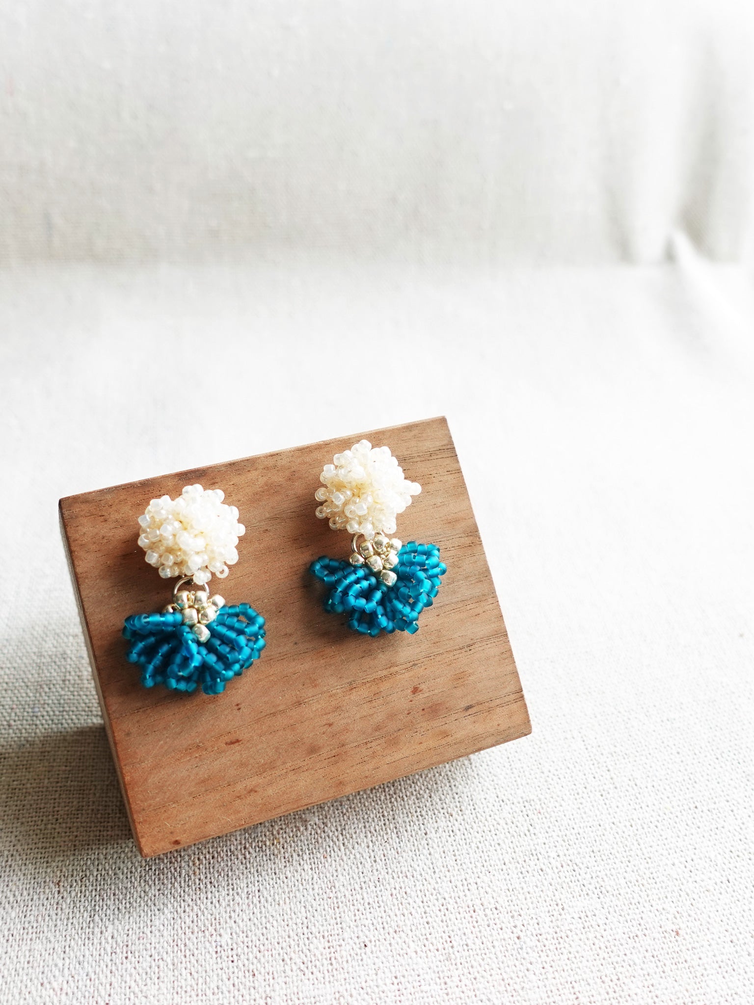 Phoenix Earrings in Teal Display Left