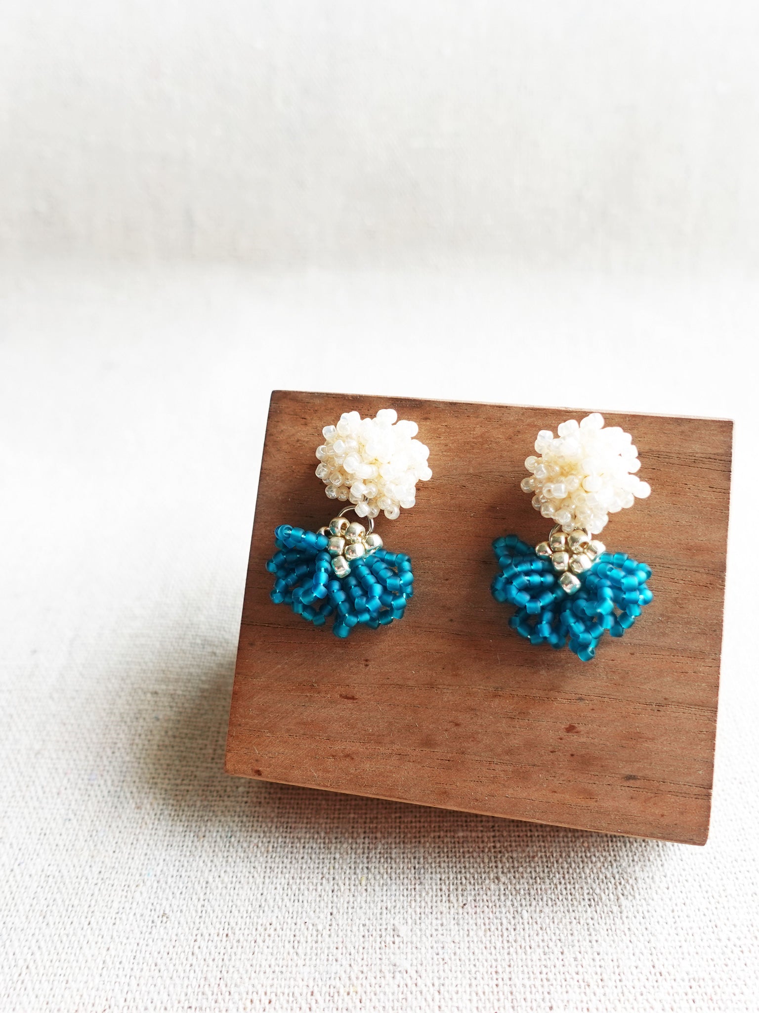 Phoenix Earrings in Teal Display Right