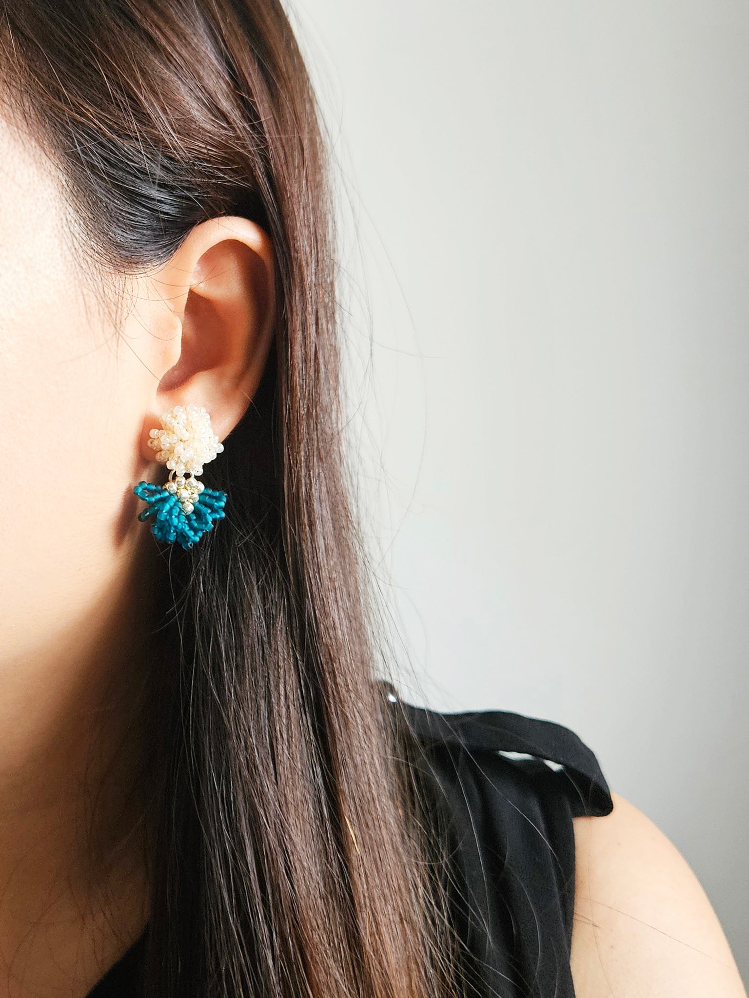 Phoenix Earrings in Teal Model